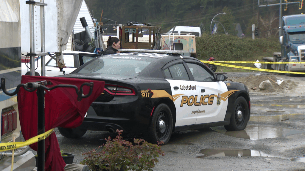 Abbotsford Police investigate a homicide in the park-and-ride lot off Parallel Road near Whatcom Road on Tuesday March 24, 2026.