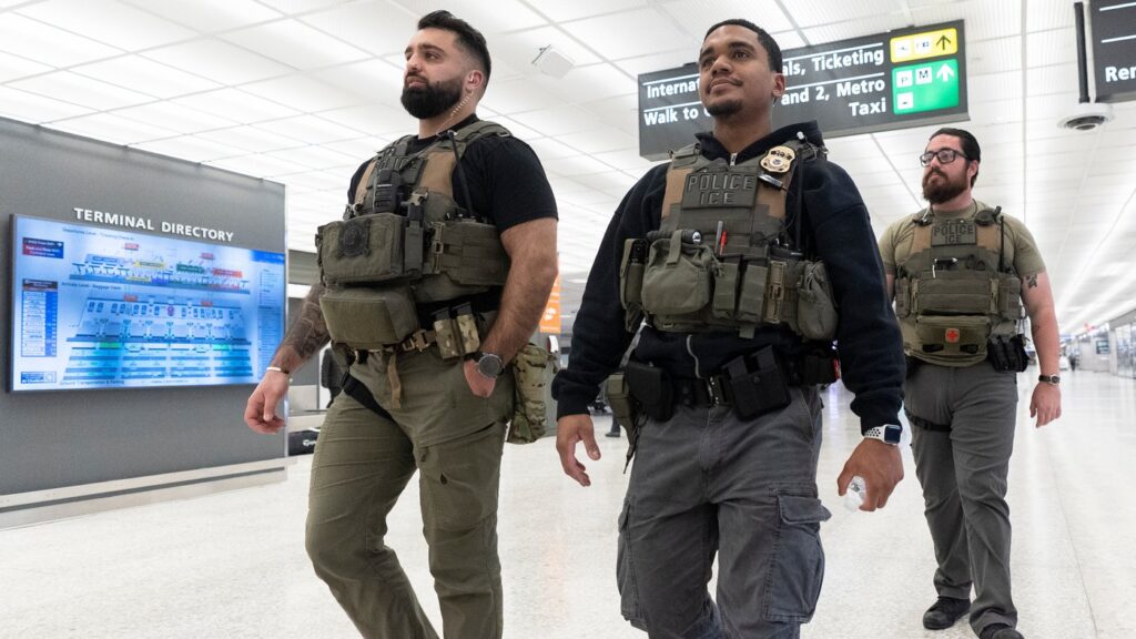 U.S. Immigration and Customs Enforcement's (ICE) agents patrol around the Washington Dulles International Airport, in Chantilly, Va., Tuesday, March 24, 2026. (AP Photo/Manuel Balce)