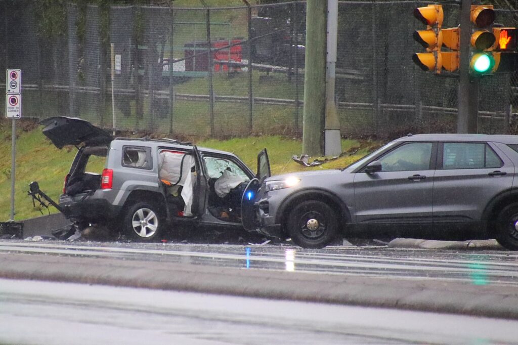 Police investigate a collision on the Barnet Highway in Burnaby on Tuesday April 14. 2026.
