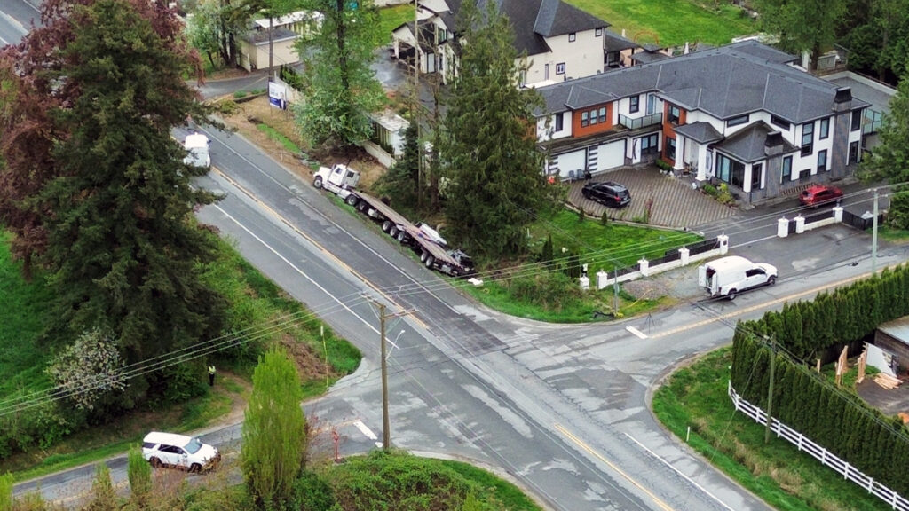 Police investigate a collision on 264 Street, between 16 Avenue and 28 Avenue.