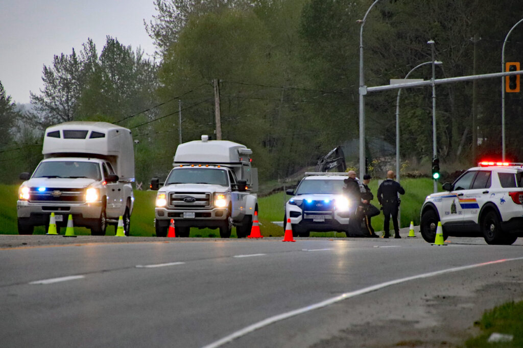 Police respond to the scene of a crash on Lougheed Highway in Maple Ridge
