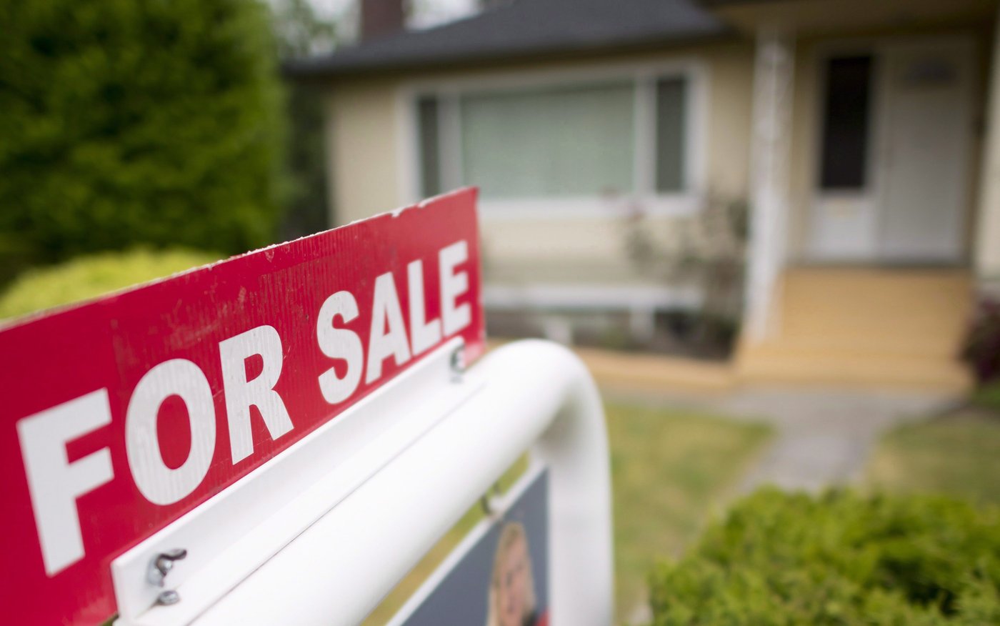A Vancouver real estate billboard (British Columbia) pictured on Tuesday, June 12, 2018. CANADIAN PRESS Jonathan Hayward CANADIAN PRESS