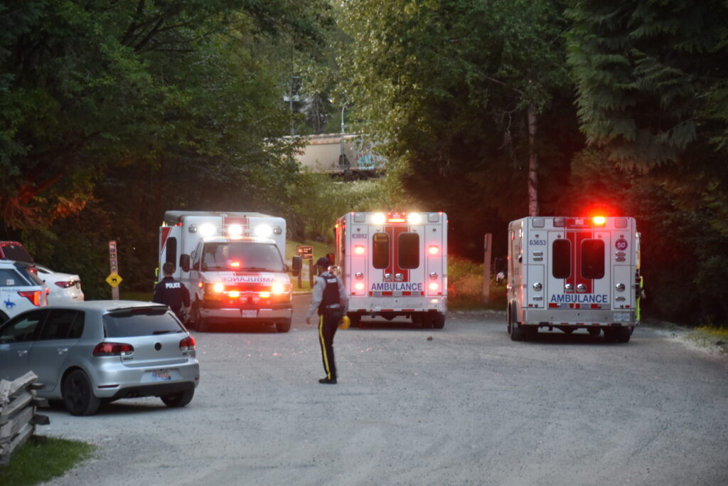 Emergency crews respond to the scene after a boat operator crashed into a train bridge in Maple Ridge