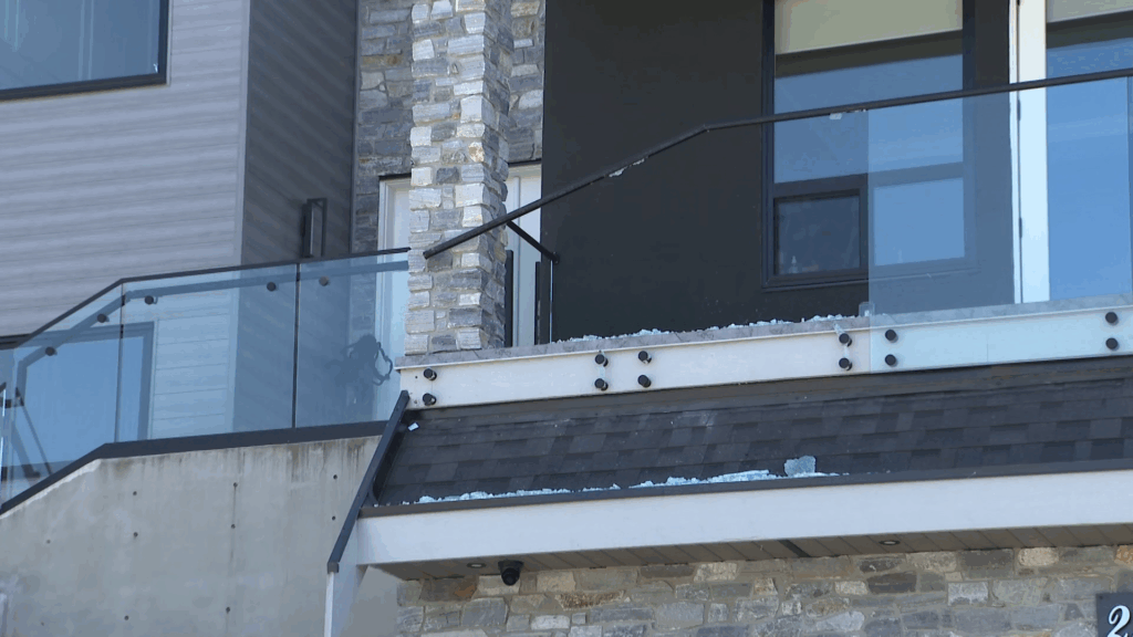 Bullet holes and shattered glass can be seen outside a house that was targeted in Langley on Friday June 12, 2026.