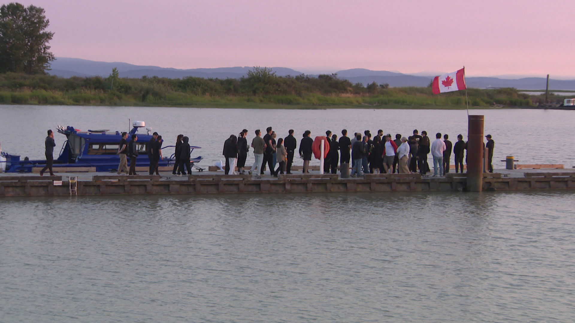 Mourners gather in Richmond on Sunday July 6, 2026. (CityNews Image)