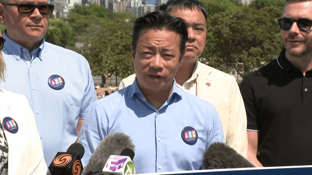 Ken Sim speaks at Kits Pool on July 13, 2026.