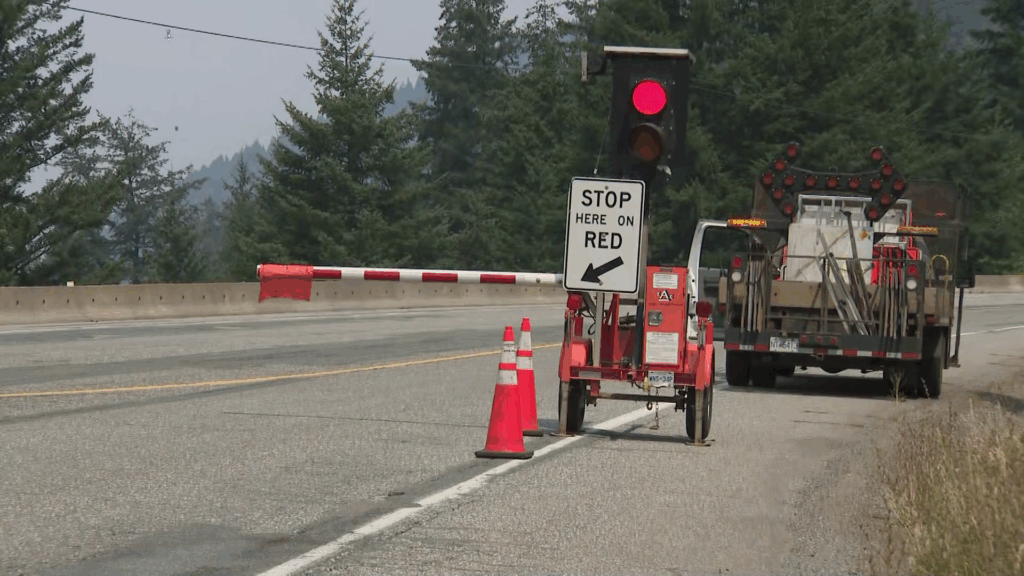 Wildfires are seen near Boston Bar, B.C. as Highway 1 closes on Thursday July 16, 2026.