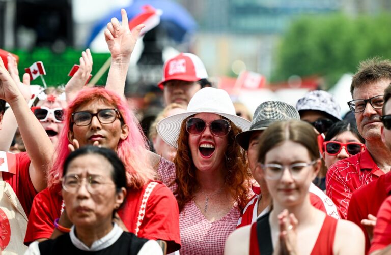 Spectators take in Canada Day celebrations at LeBreton Flats in Ottawa, on Tuesday, July 1, 2025. THE CANADIAN PRESS/Spencer Colby